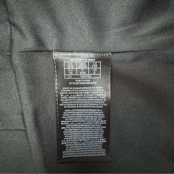 Black and white striped Guess sleeveless crop top. Gold zipper closure. - Picture 9 of 9